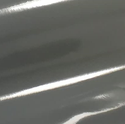 a close up of a shiny silver surface