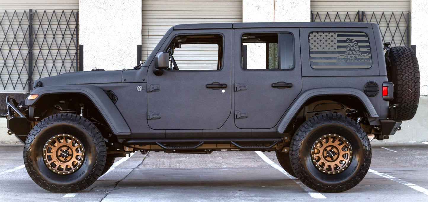 a black jeep parked in a parking lot