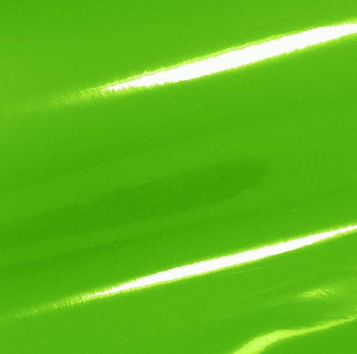 a bright green background of shiny material